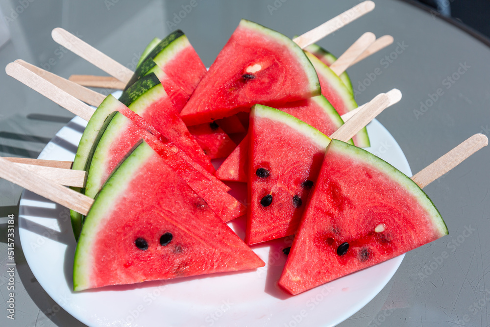 Watermelon slices on ice cream sticks