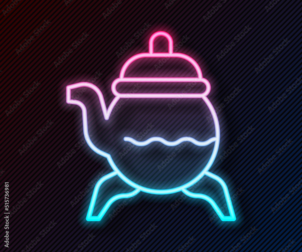 Glowing neon line Classic teapot icon isolated on black background. Vector