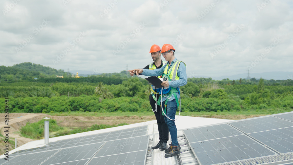 Two engineers are talking about solar cells.