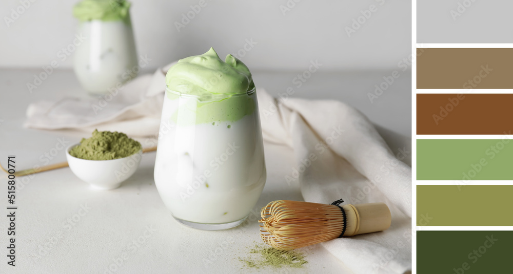 Glass of tasty dalgona matcha latte on light table. Different color patterns