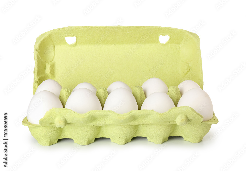 Open holder with chicken eggs isolated on white background