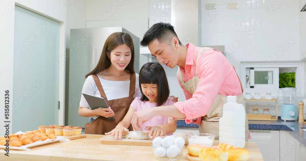 asian family are cooking together