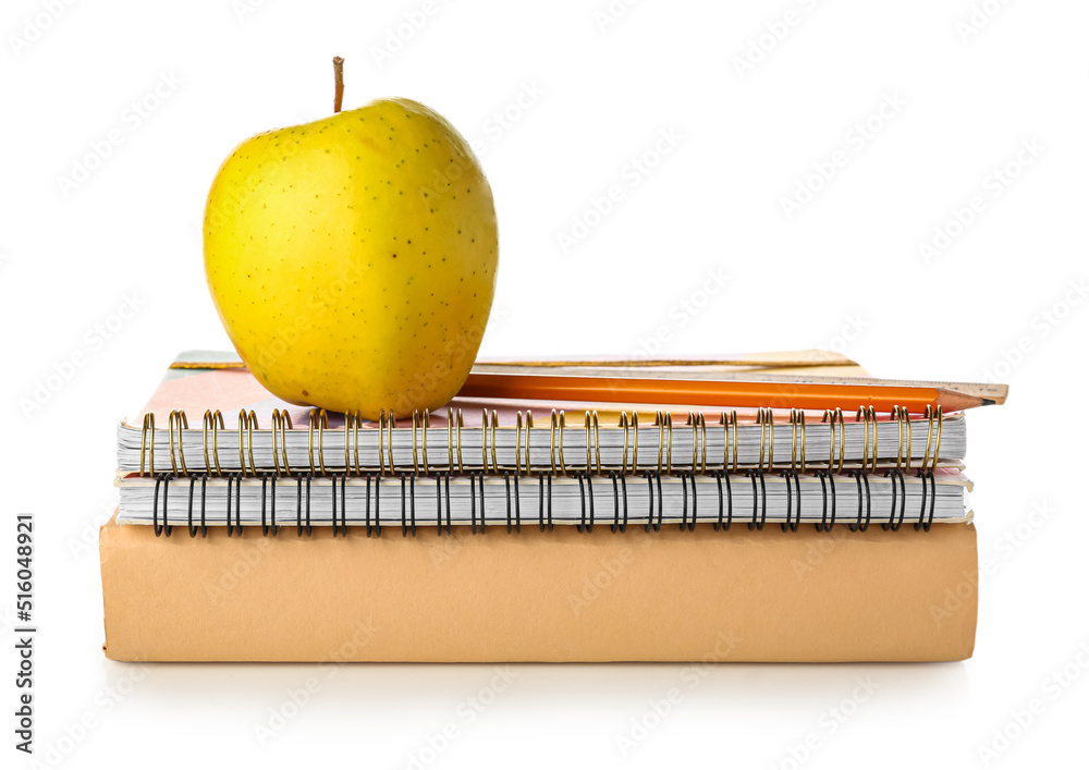 School stationery with apple on white background