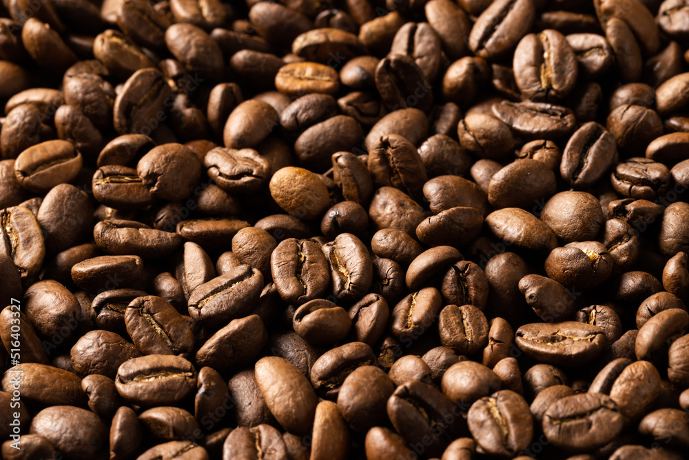 Image of close up of pile of roasting brown coffee beans