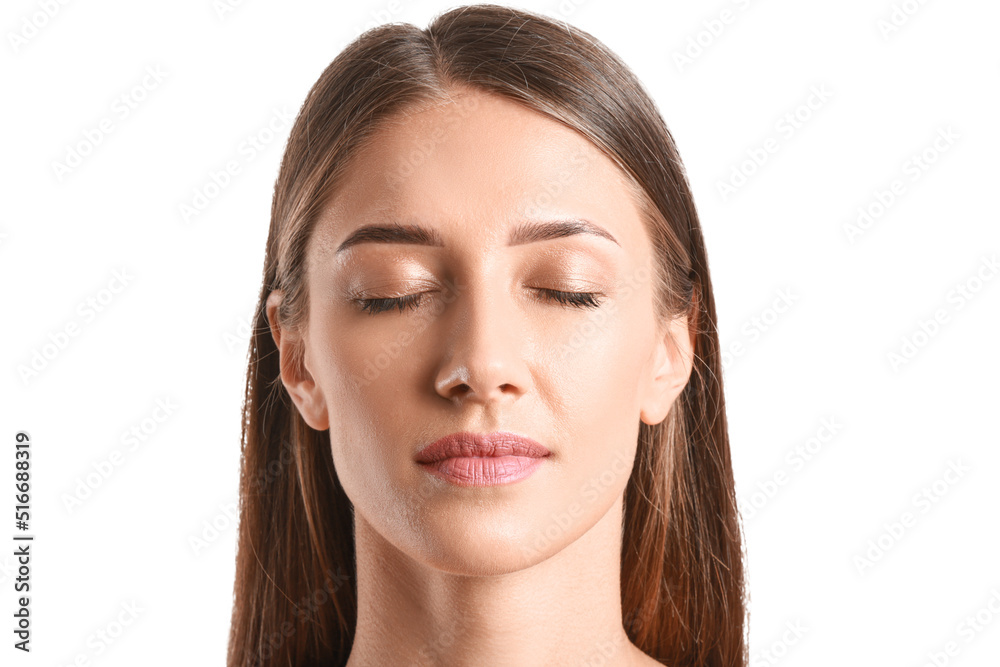 Young tanned woman on white background, closeup