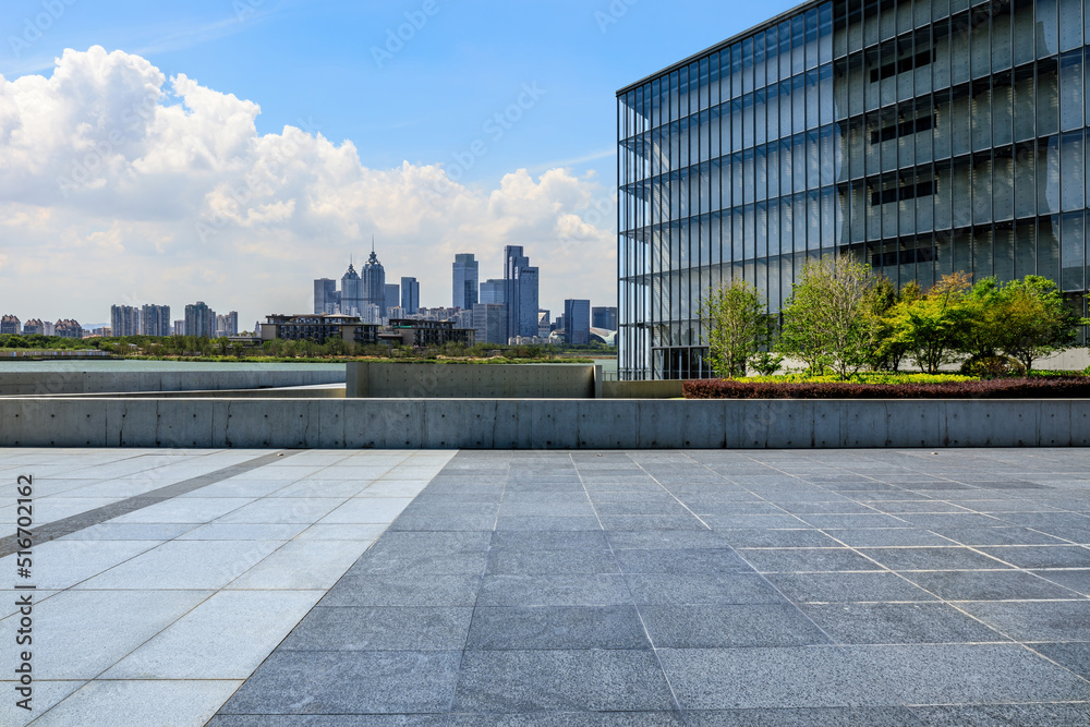 Cityscape of Suzhou City, Jiangsu Province, China. Empty square floor and city skyline scenery.