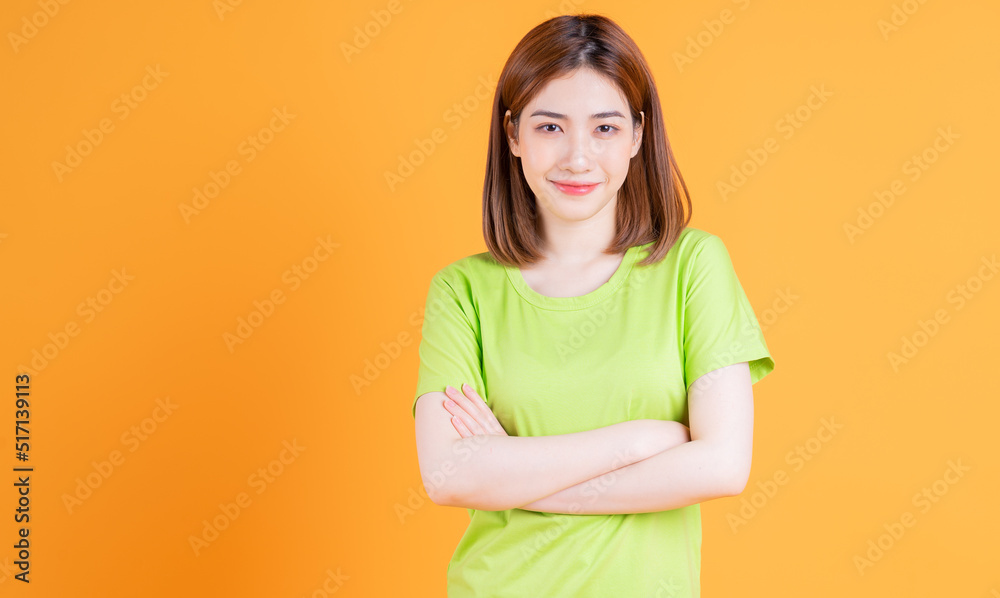 Photo of young Asian girl posing on background