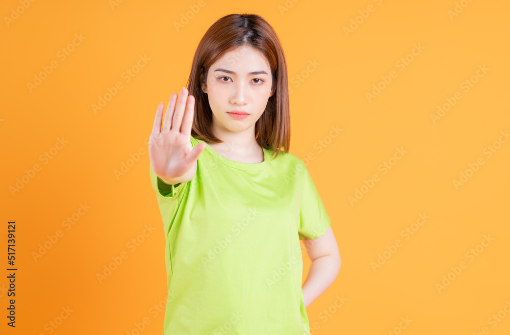 Photo of young Asian girl posing on background