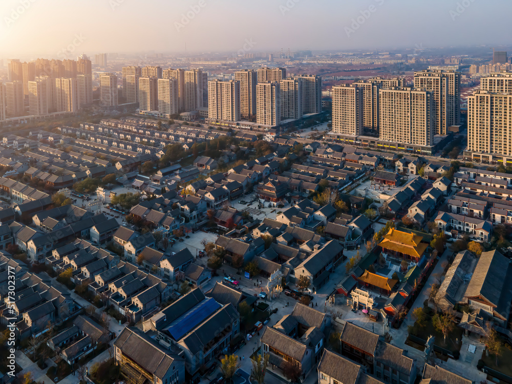 Aerial photography of the ancient city of Jimo under the sunset