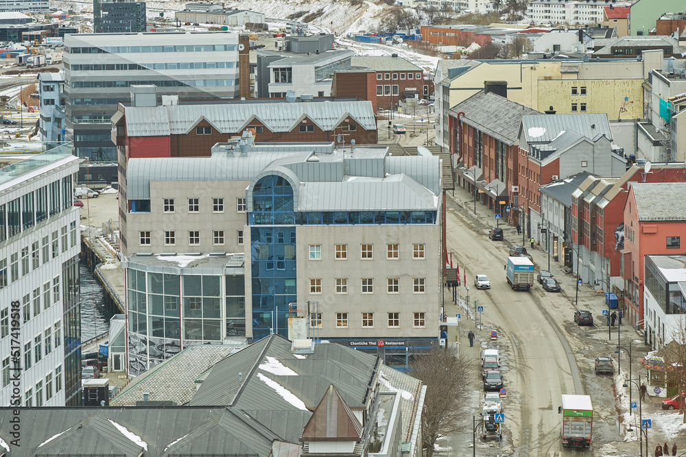 Aerial view of Bodo city in Norway with a busy main road. A scenic modern urban landscape of streets