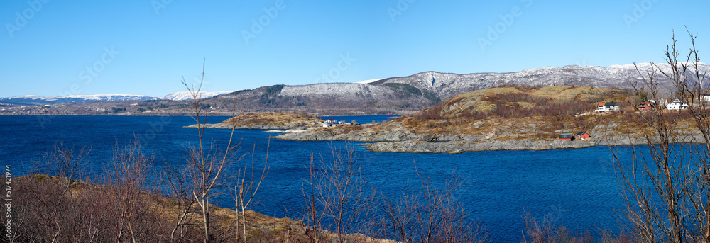 The city of Bodo and its surroundings during the day in summer. Landscape view of a lake against a b