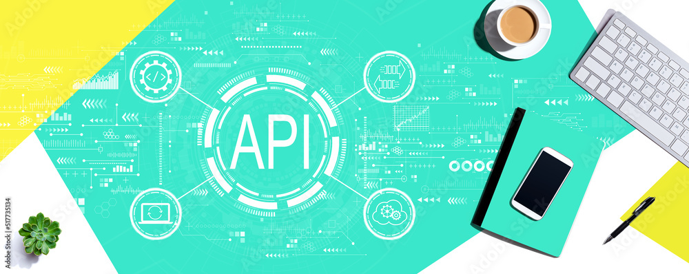 API - application programming interface concept with computer keyboard and office items