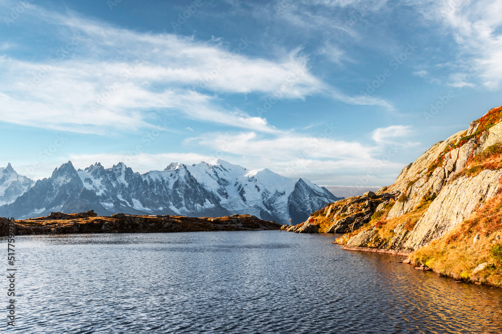 Incredible view of clear water and sky reflection on Chesery lake (Lac De Cheserys) in France Alps. 