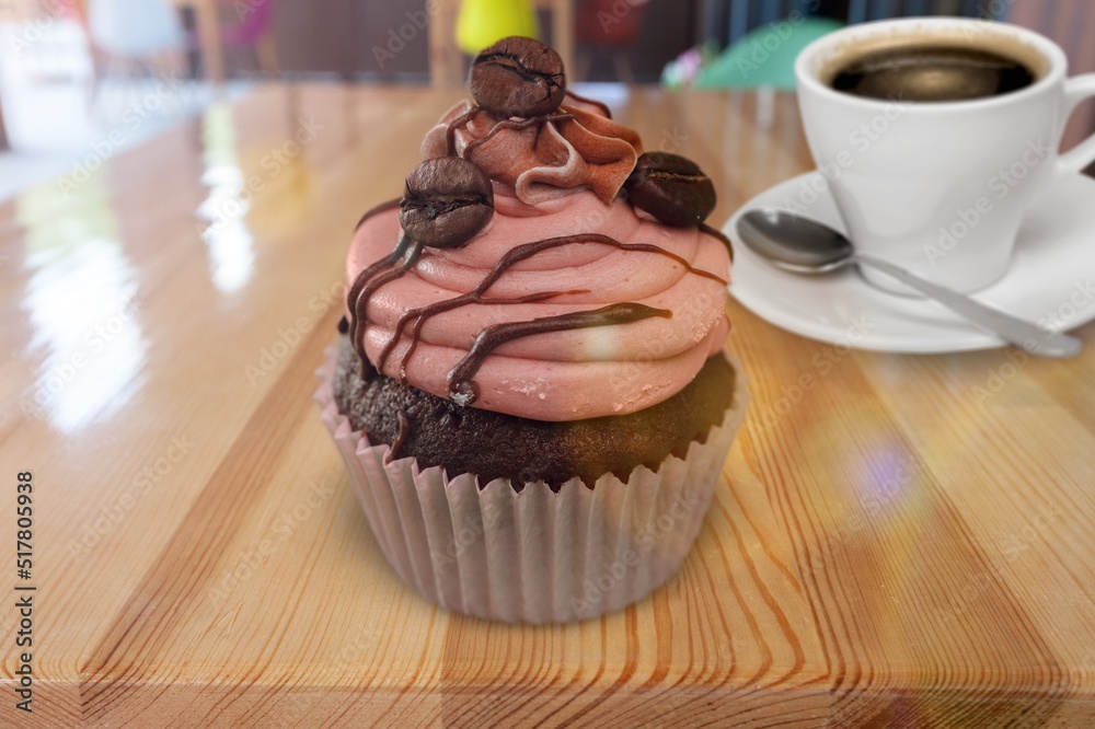 Tasty sweet cup cake and muffin and filter coffee americano.