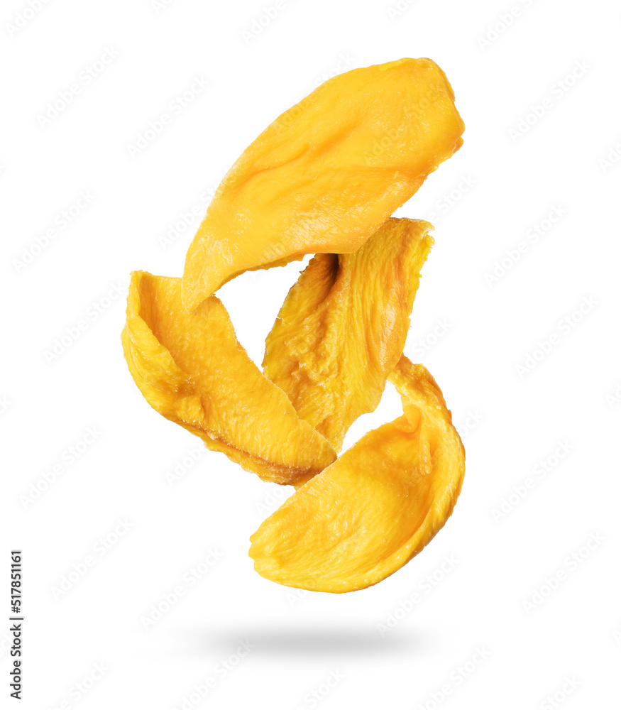 Delicious dried mango in the air closeup isolated on a white background