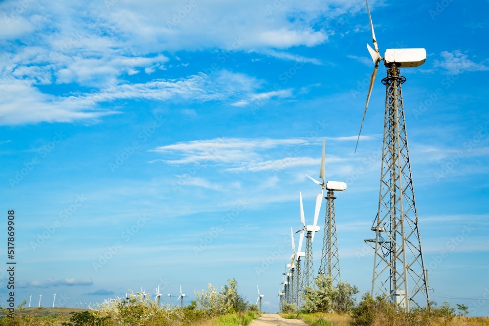 Wind turbines on sky background. Green ecological power energy generation.