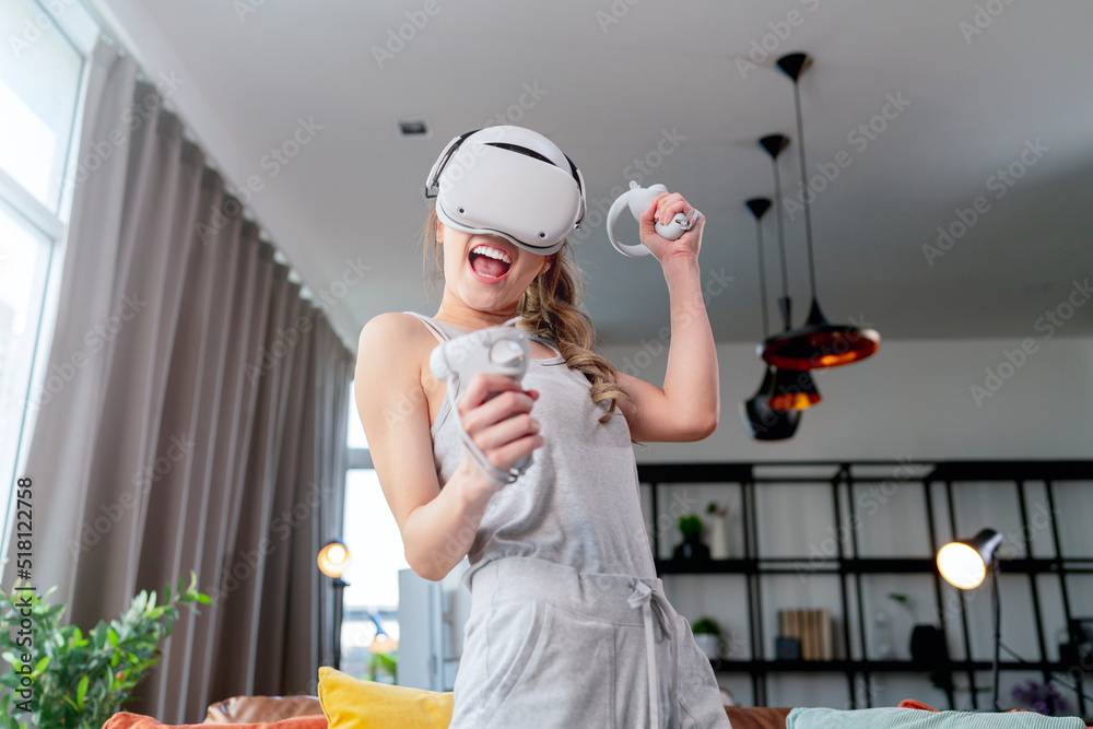 exitied enjoy 3d virtual gaming futuristic experience young asian female wear vr headset technology 