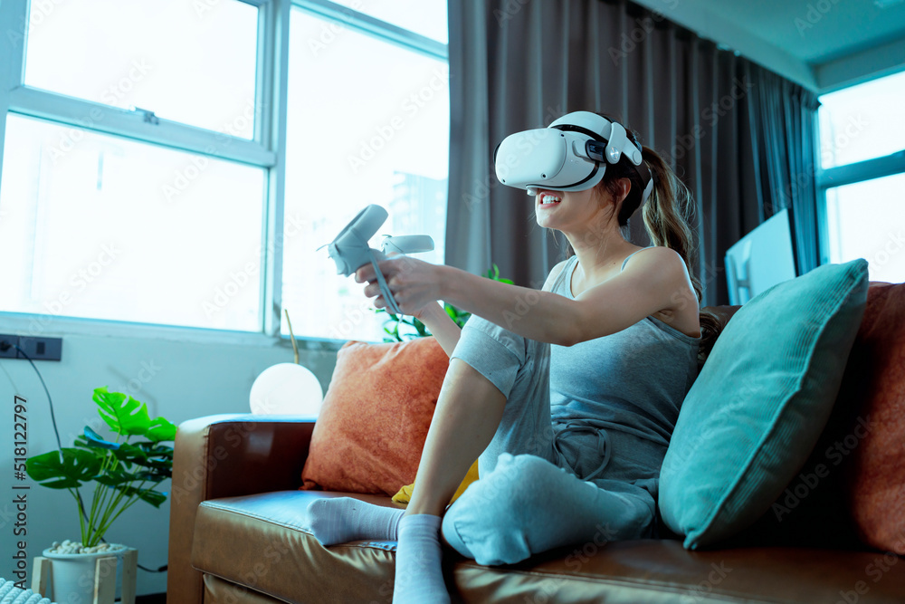 exitied enjoy 3d virtual gaming futuristic experience young asian female wear vr headset technology 