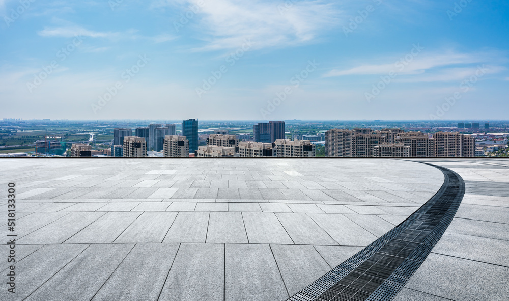 Empty square floor and city skyline with modern buildings scenery