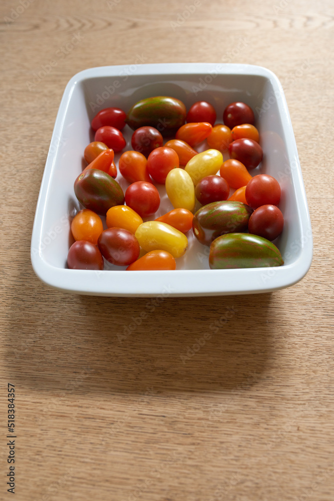 Food stuff. Fresh harvested colorful tomatoes. Group of healthy multi colored and organic cherry tom