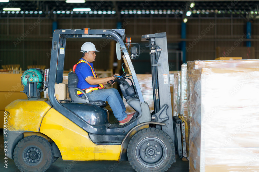 Forklift are loading into cargo containers at warehouses, ports, freight forwarding, cargo supply ch