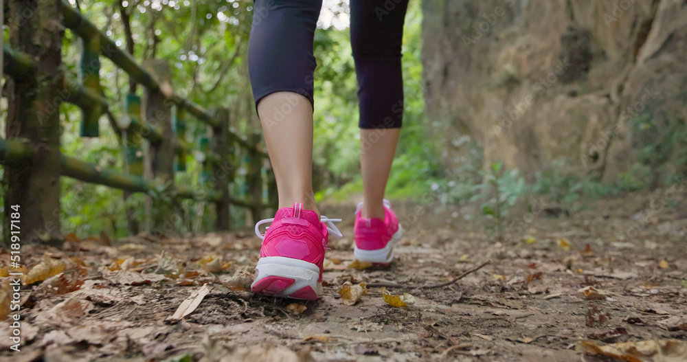 woman walk on mountain stairs