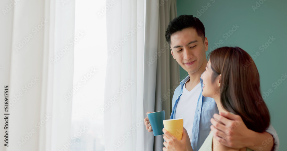 happy asian couple having tea