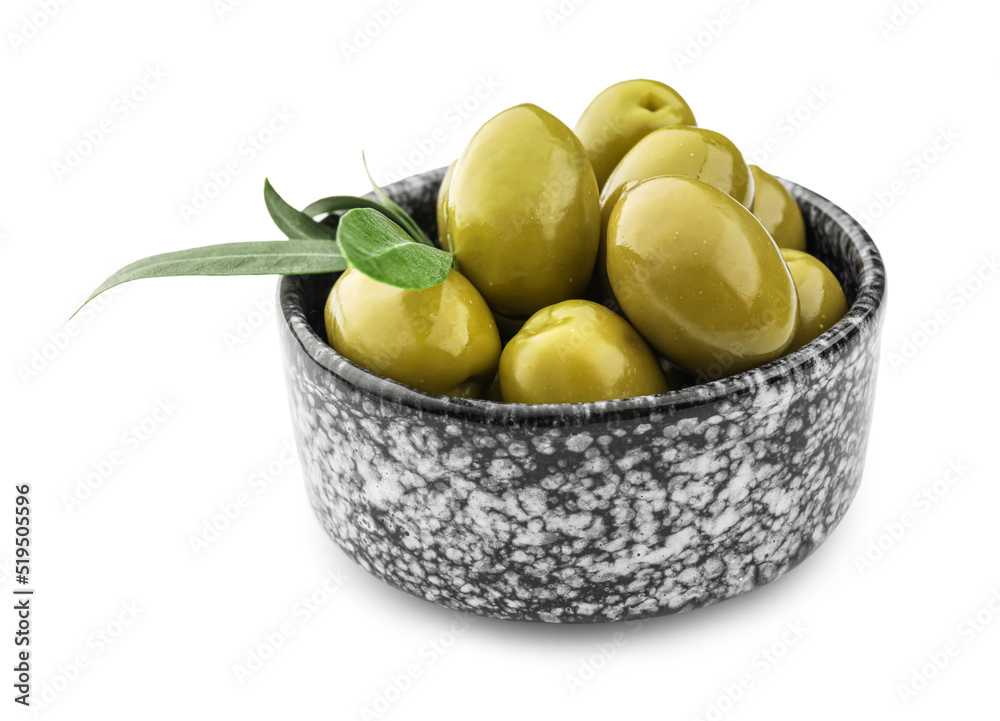 Bowl with tasty green olives on white background