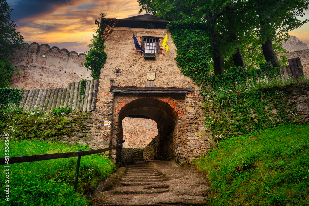 Chojnik Castle in Karkonosze mountains at sunset. Poland