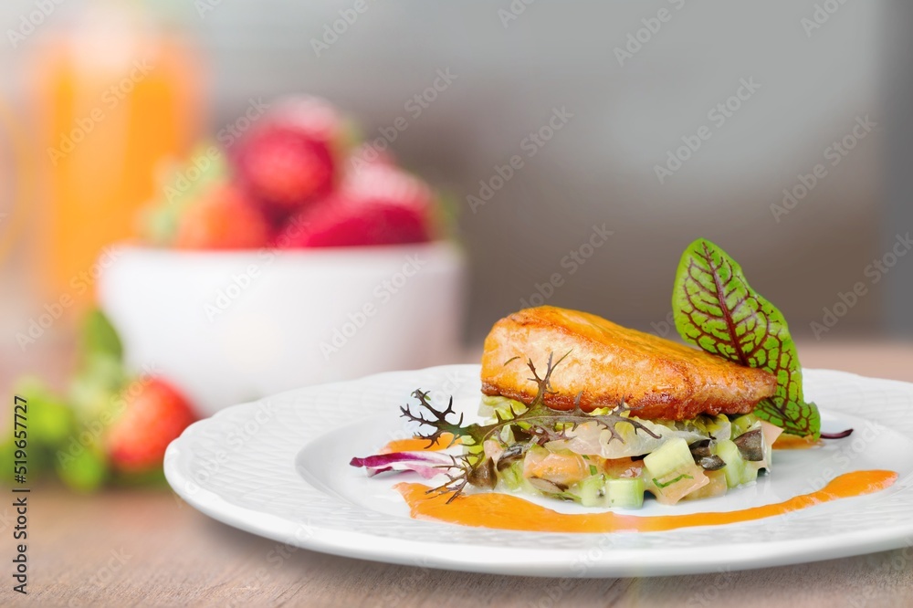 Tasty fish fillet on a white plate