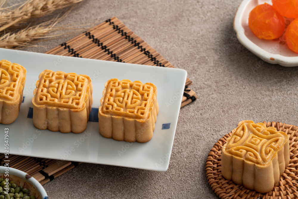 Delicious mung bean moon cake for Mid-Autumn Festival food mooncake on gray table background.