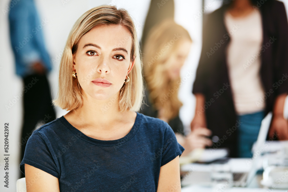 Portrait of proud, confident and serious female designer, manager or assistant inside a blurred offi