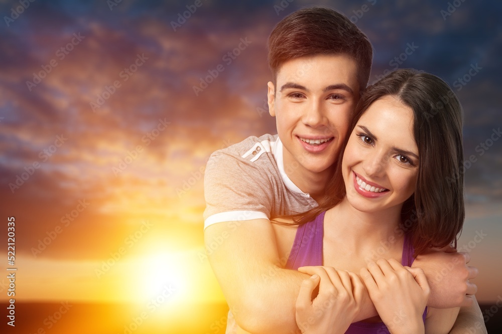 Young cheerful happy couple to joyful, over sea beach ocean outdoor seaside in summer day