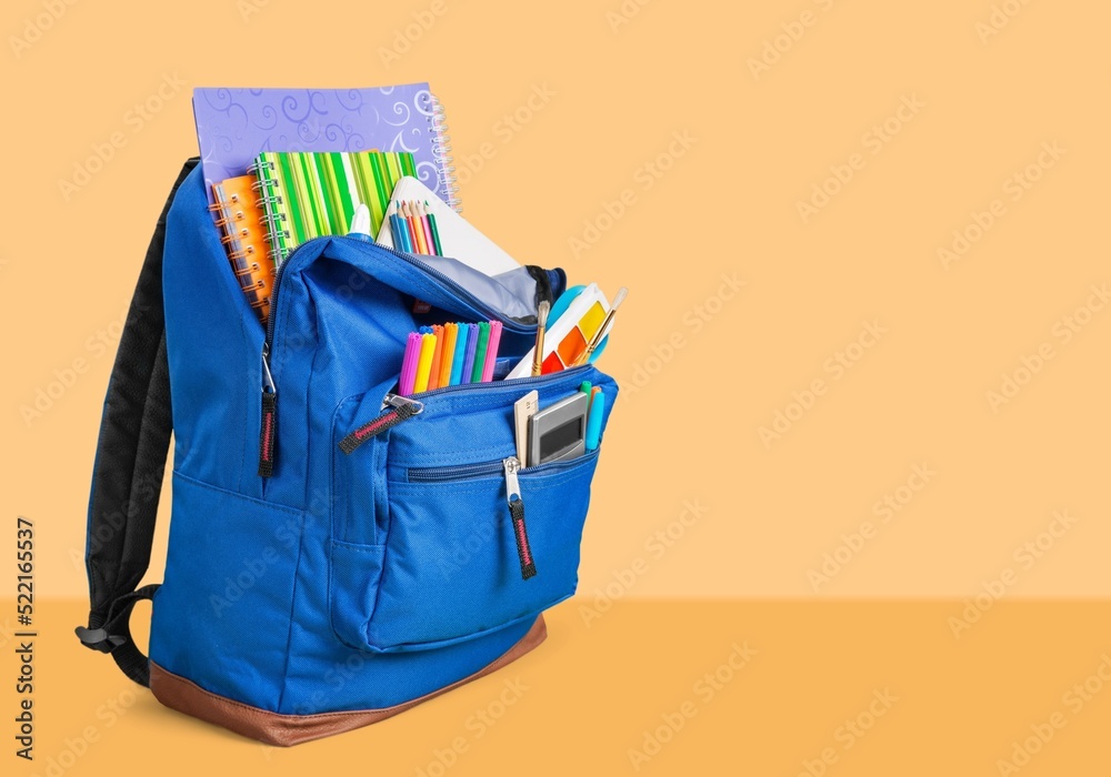 Opened School backpack with stationery. Concept back to school. School supplies