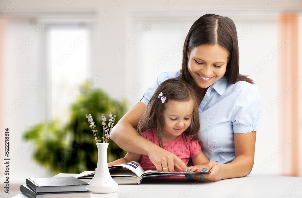 Happy family mother and child education. Mom with kid