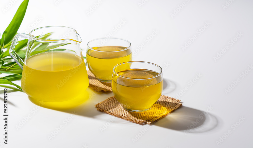 Cold green tea placed on a white background.