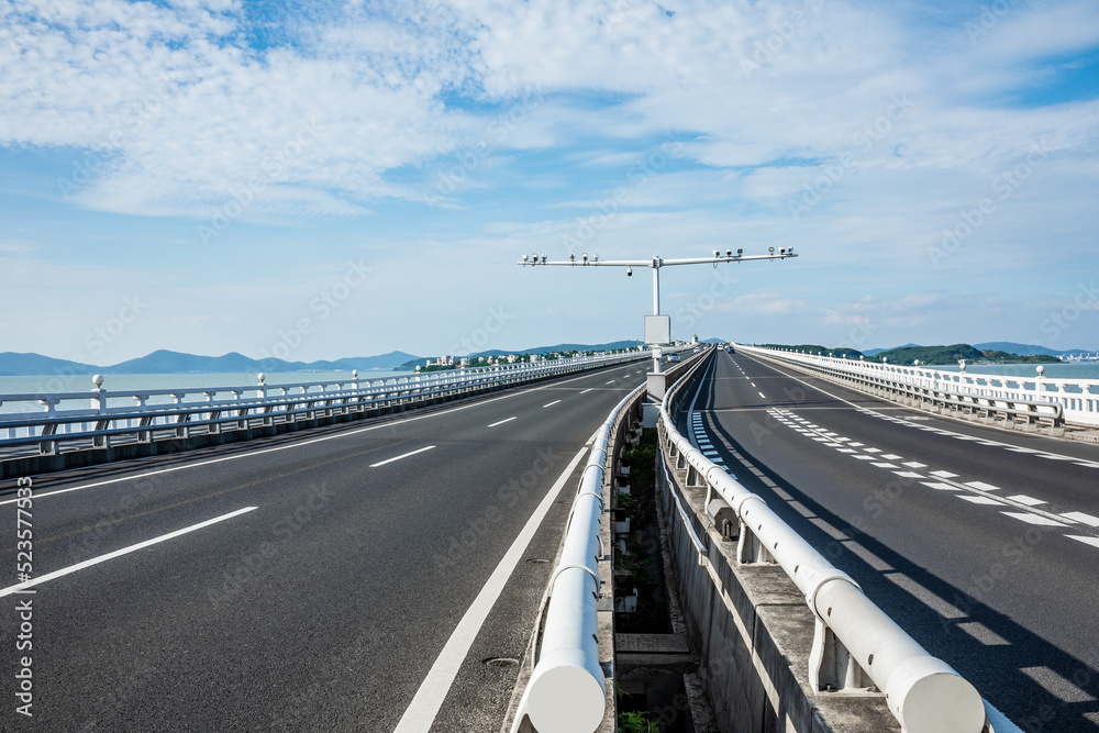 Empty asphalt highway scenery by the sea