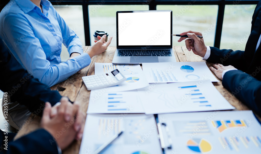 business partnership coworkers analysis strategy with discussing a financial planning graph and comp