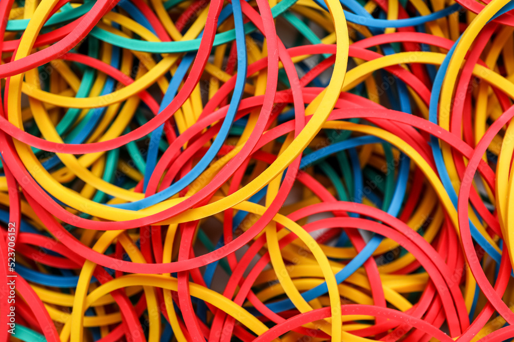 Many colorful rubber bands as background, closeup