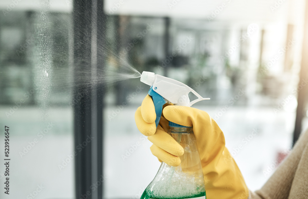 Clean, wash and day chores at home with a household hygiene spray bottle for windows inside. Closeup