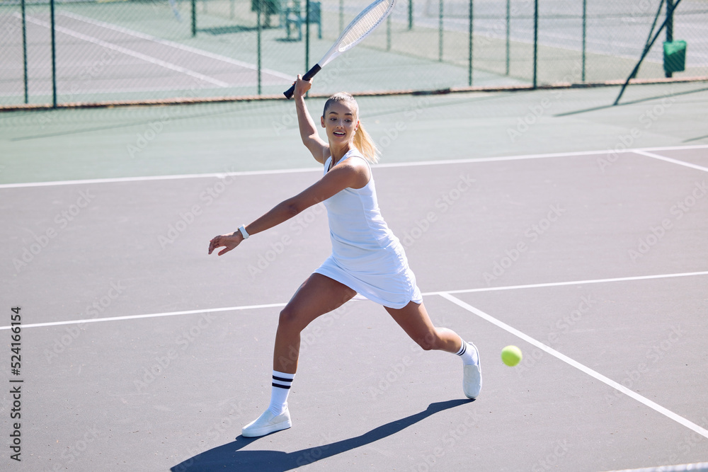 Fitness, balance and sport with athletic tennis player playing competitive match at a tennis court. 