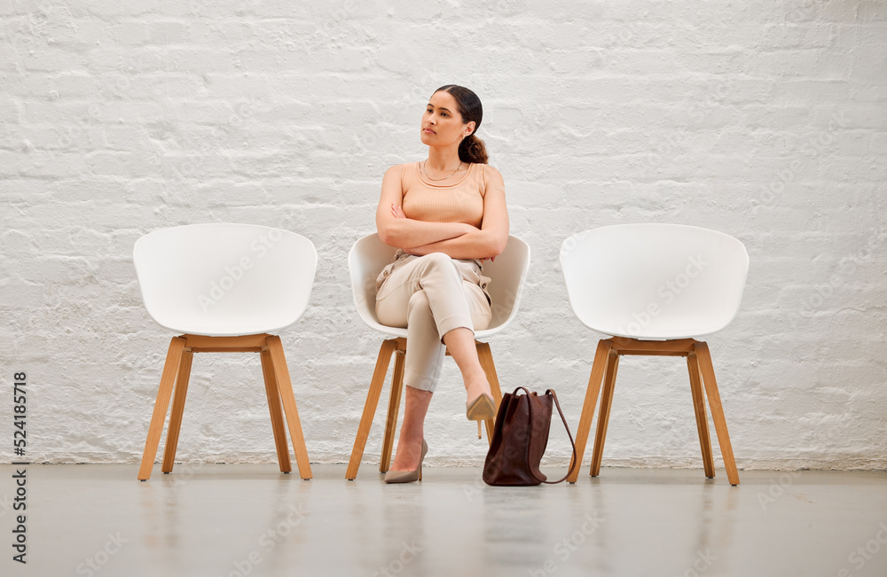 Employment, hiring and recruitment with a young business woman sitting on a chair waiting for her in