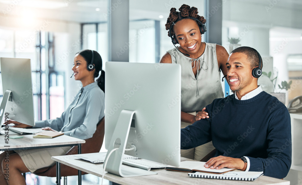 Manager training call center agent on computer with talking, discussing and negotiating deals, sales