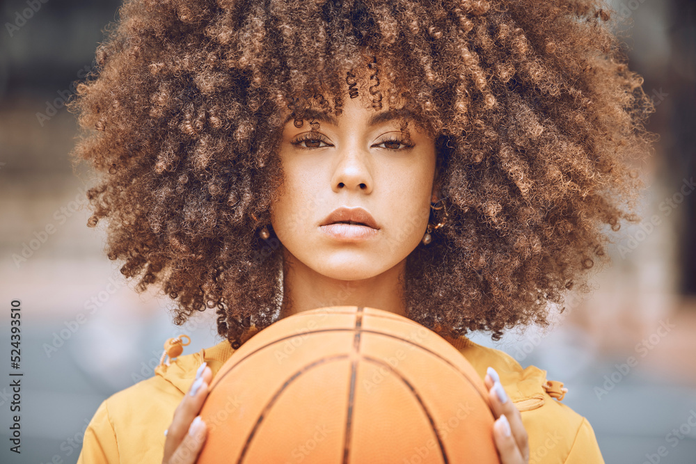 Basketball, sports and motivation with a young, fashion and healthy black woman holding a ball with 