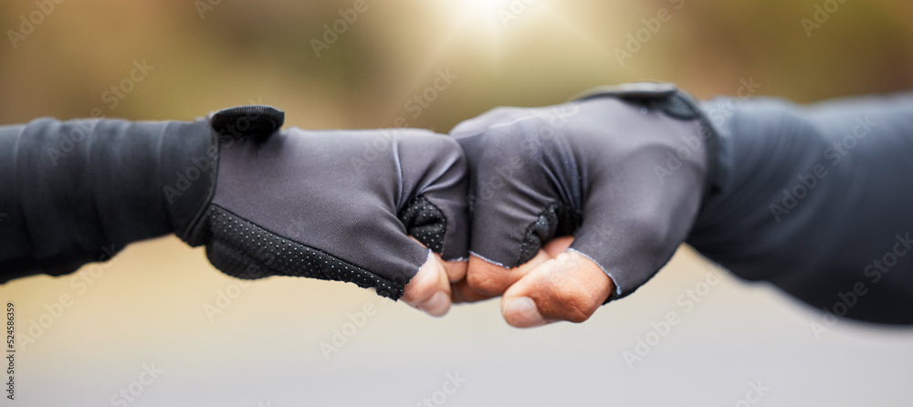 Motivation, teamwork and unity with hands in gloves fist bump to show collaboration, solidarity and 