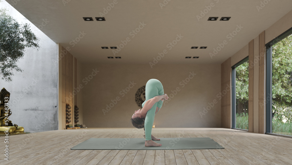 Young athletic attractive woman practicing yoga in a wooden yoga hall.