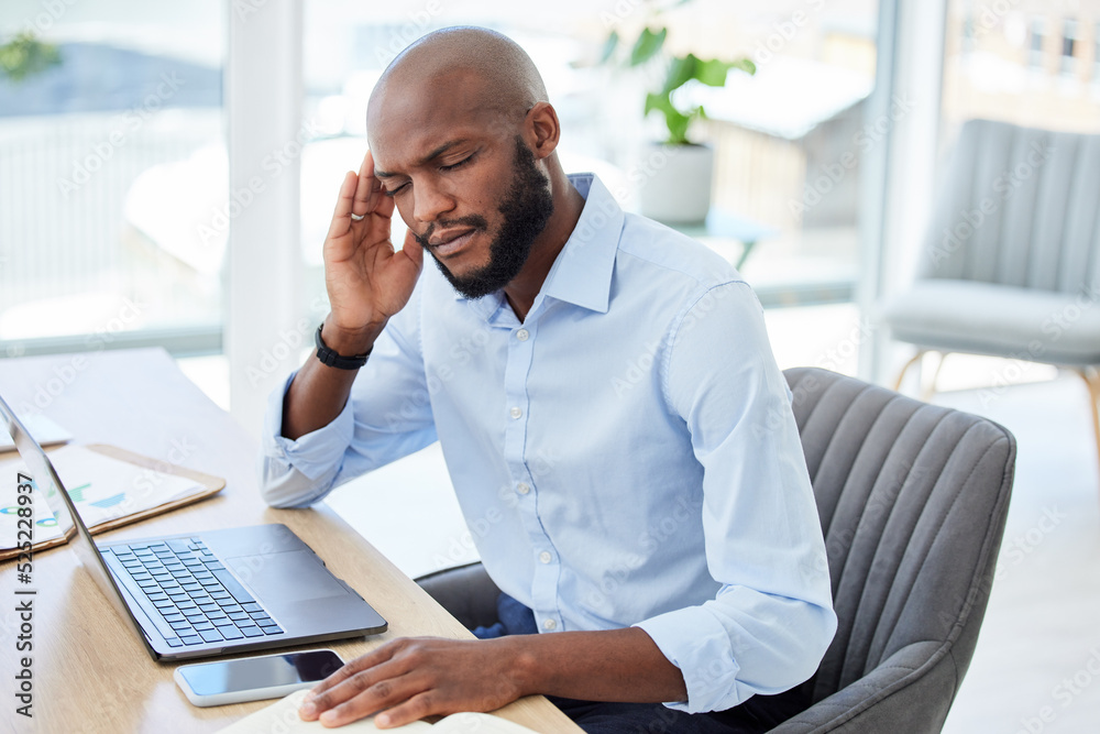 Burnout, headache and stressed businessman working on laptop with problem, bad mental health or stre