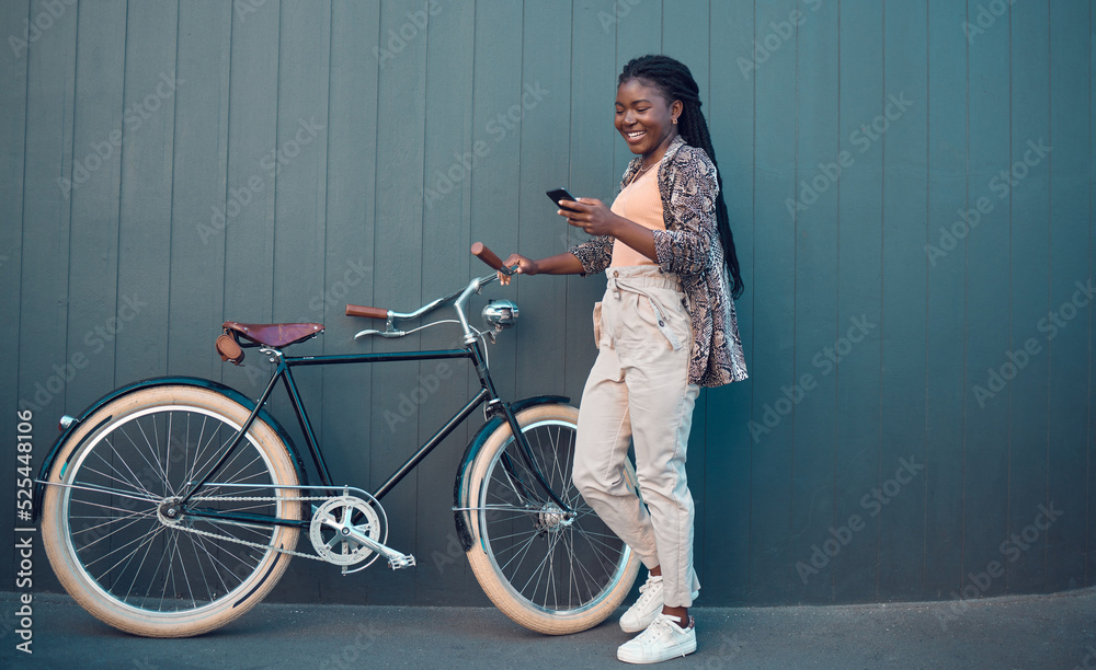 Girl, relax with bicycle and using smartphone app, social media and doing a internet or web search. 