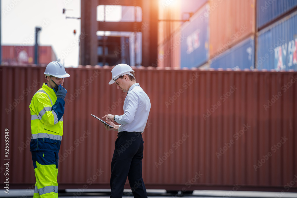 Industrial engineer and inspector or safety supervisor working in container terminal,Container in ex