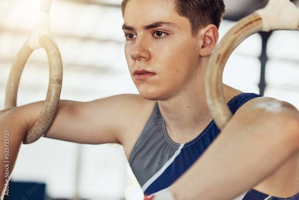 Sport, exercise and training rings for a gymnastics athlete or gymnast in a gym. Fit and active spor